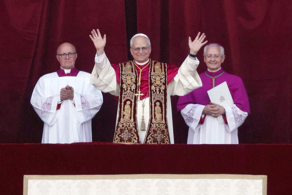 VATICAN CITY, VATICAN - MAY 8: The newly elected Pontiff, Pope Leo XIV is seen for the first time from the Vatican balcony on May 8, 2025 in Vatican City, Vatican. White smoke was seen over the Vatican early this evening as the Conclave of Cardinals took just two days to elect Cardinal Robert Francis Prevost, who will be known as Pope Leo (Leone) XIV, as the 267th Supreme Pontiff after the death of Pope Francis on Easter Monday.