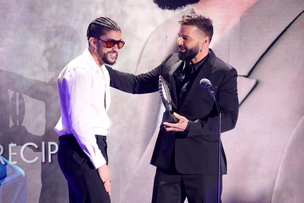 Bad Bunny and Ricky Martin speak onstage during the GLAAD Media Awards