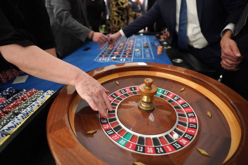 NEW YORK, NEW YORK - DECEMBER 03: Guest play Roulette during the ADAPT Santa Project Party Casino Night at the Down Town Association on December 03, 2019 in New York City. (Photo by Jemal Countess/Getty Images for ADAPT Community Network)