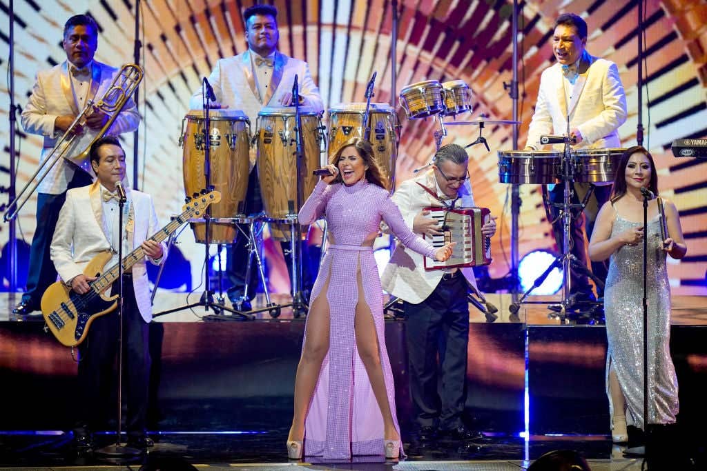 MIAMI, FLORIDA - FEBRUARY 18: Gloria Trevi performs with Los Ángeles Azules onstage during Univision's 33rd Edition of Premio Lo Nuestro a la Música Latina at AmericanAirlines Arena on February 18, 2021 in Miami, Florida. (Photo by Rodrigo Varela/Getty Images for Univision)